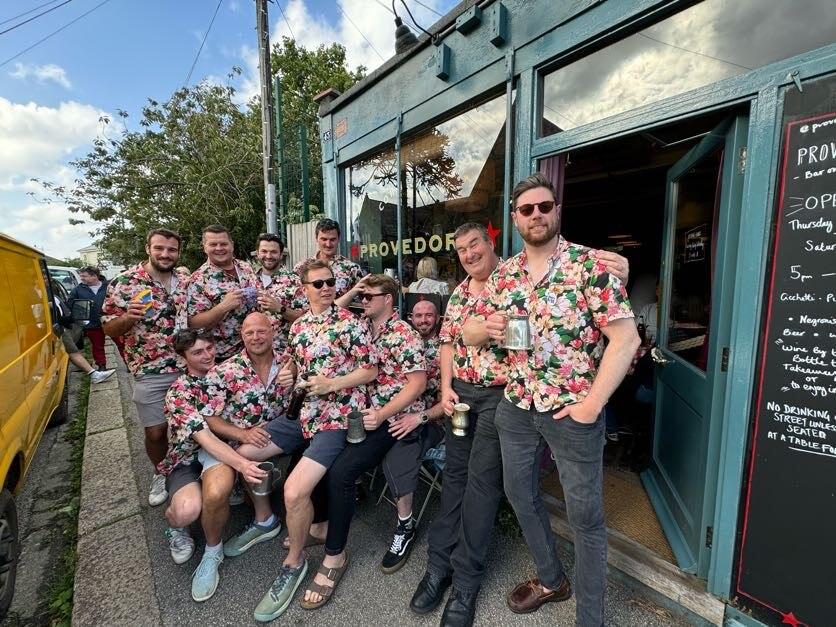 The band posing for a photo